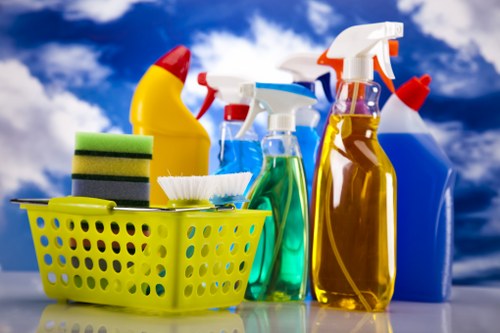 Cleaner wiping kitchen surfaces during after builders cleaning in Collierswood