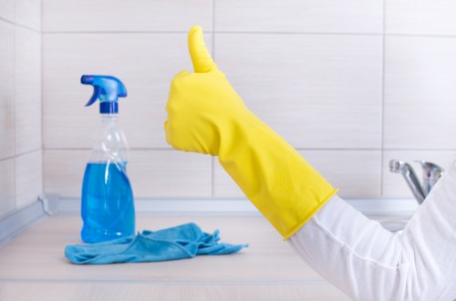 Upholstery cleaning equipment used on a fabric sofa